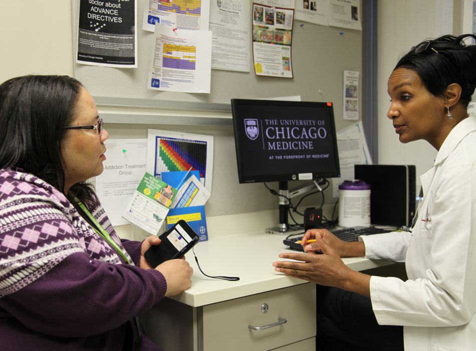 Dr. Monica Peek doing diabetes testing